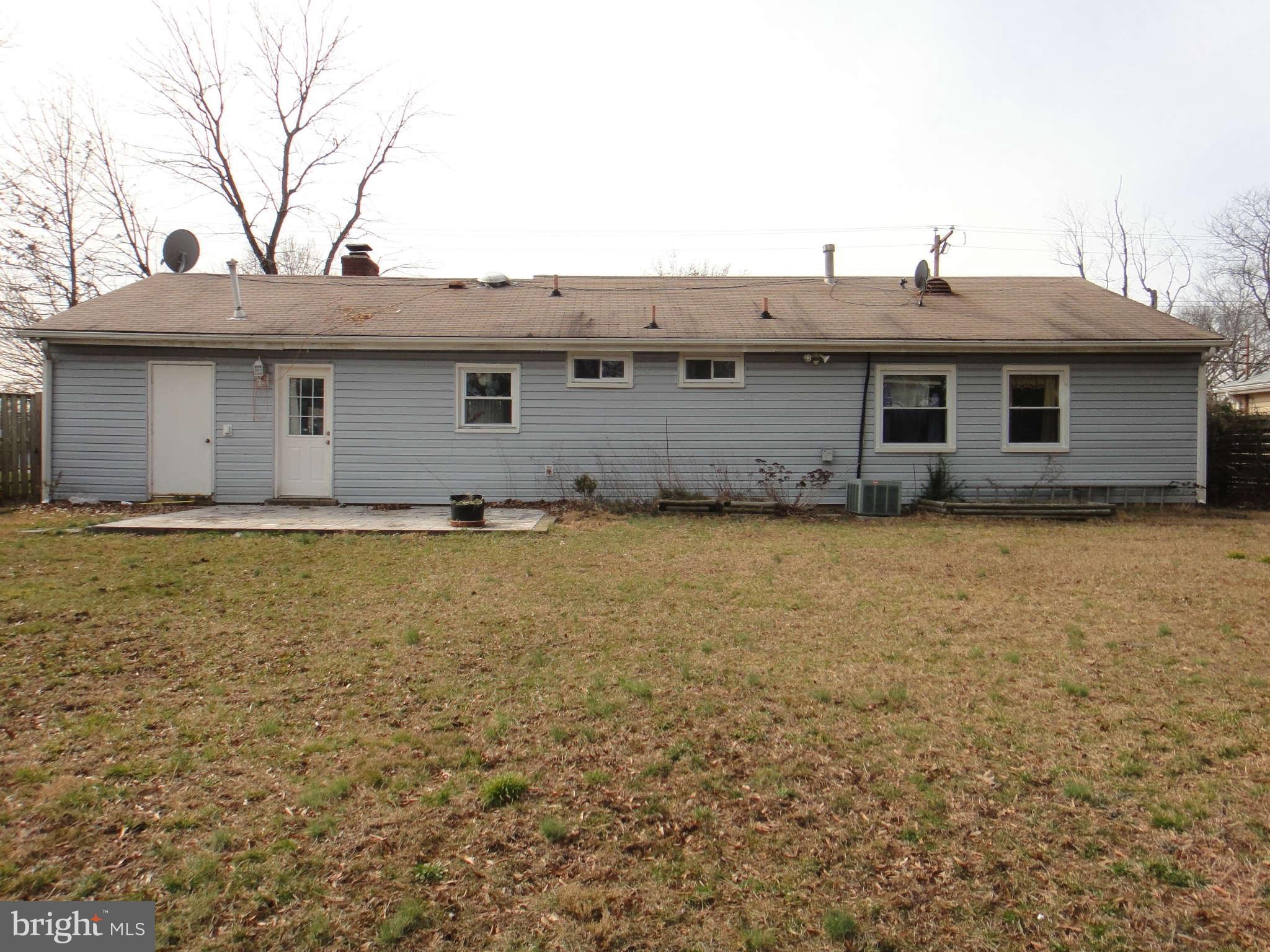 6221 Frontier Drive Springfield, VA 22150 - Photo 16 of 18 a front view of a house with yard