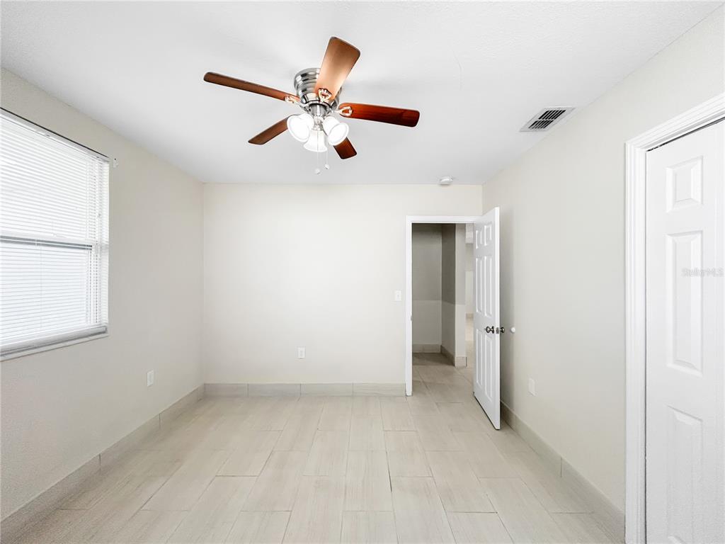 133 18th Street Northwest Ruskin, FL 33570 - Photo 11 of 25 a view of an empty room with a window