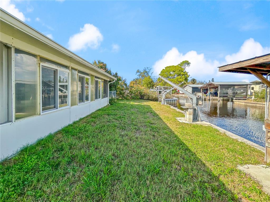 133 18th Street Northwest Ruskin, FL 33570 - Photo 3 of 25 a view of a house with a yard