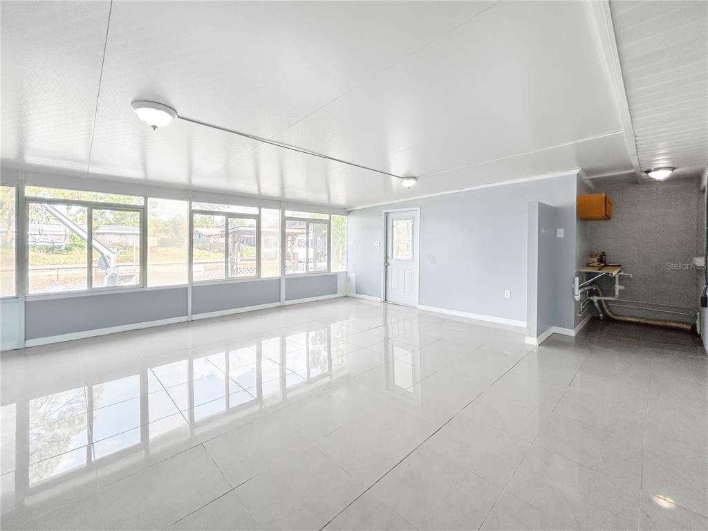 133 18th Street Northwest Ruskin, FL 33570 - Photo 6 of 25 a view of an empty room with a window