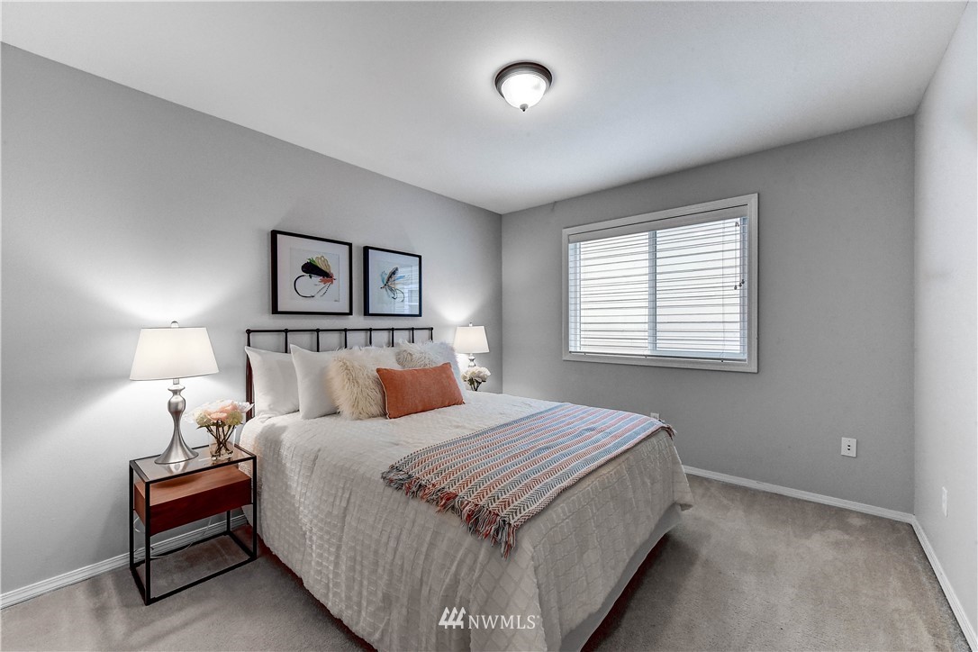 20903 Pioneer Way Edmonds, WA 98026 - Photo 16 of 21 a bedroom with bed and a window