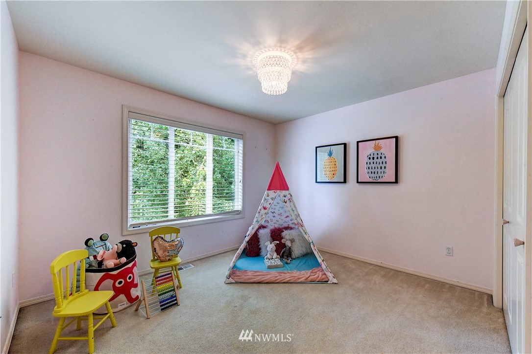 20903 Pioneer Way Edmonds, WA 98026 - Photo 18 of 21 a room with toys and a chandelier