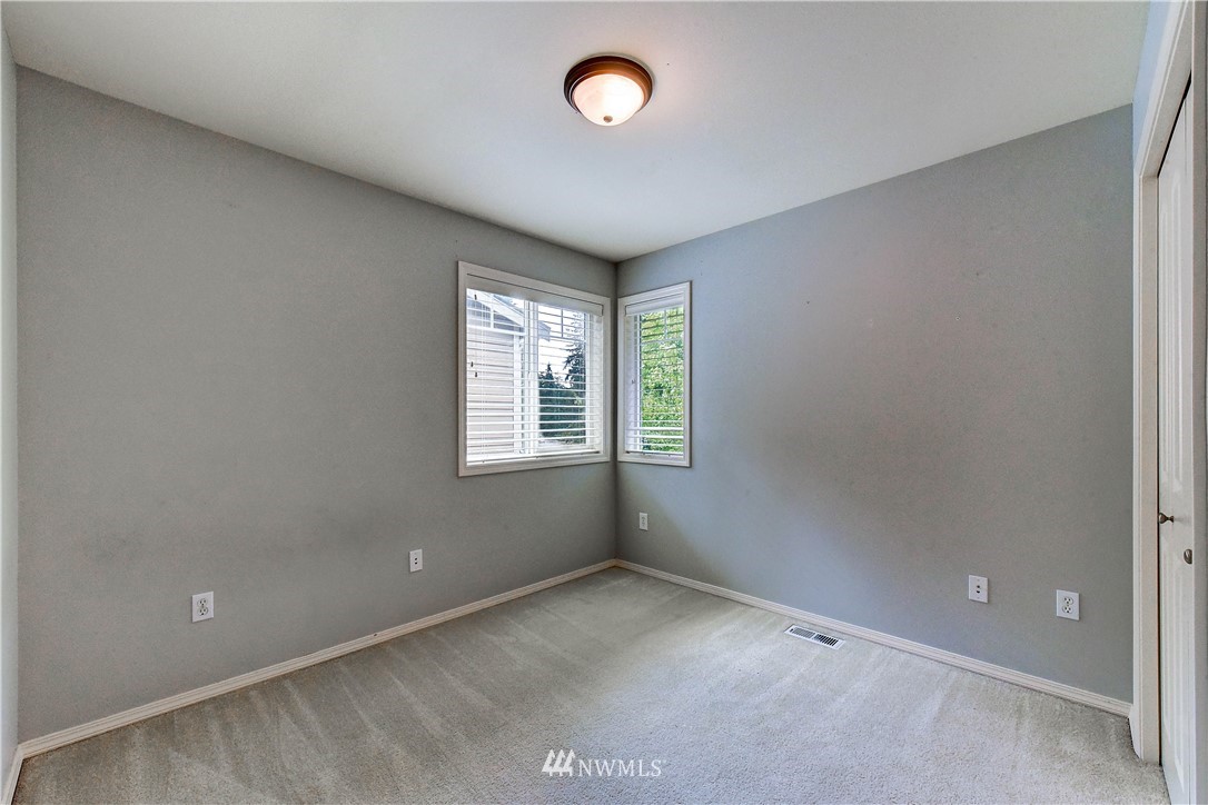 20903 Pioneer Way Edmonds, WA 98026 - Photo 19 of 21 an empty room with a fan