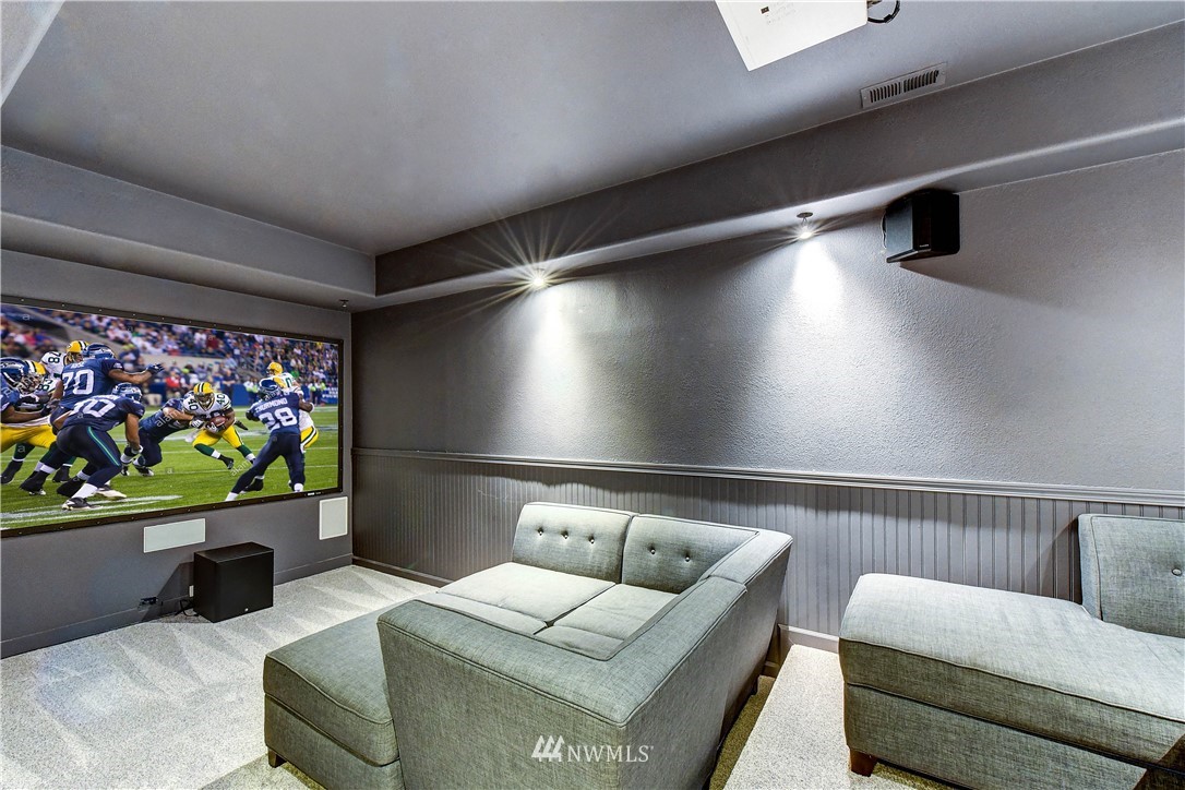 20903 Pioneer Way Edmonds, WA 98026 - Photo 20 of 21 a living room with furniture and a flat screen tv