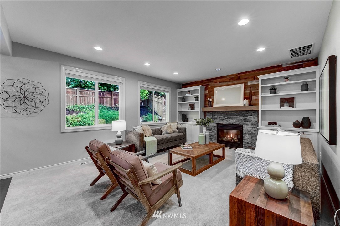 20903 Pioneer Way Edmonds, WA 98026 - Photo 4 of 21 a living room with furniture and a fireplace