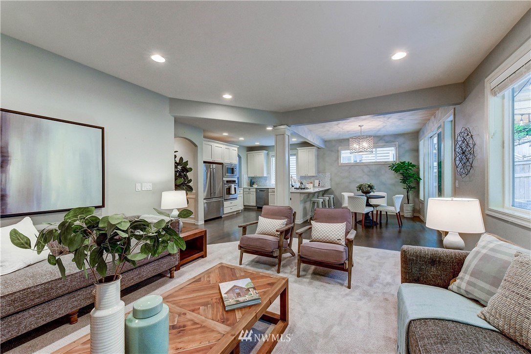 20903 Pioneer Way Edmonds, WA 98026 - Photo 10 of 21 a living room with furniture fireplace and a large window
