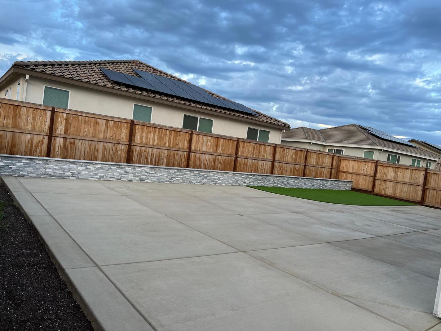1808 Apiary Way Hughson, CA 95326 - Photo 16 of 20 a view of a house with a wooden fence