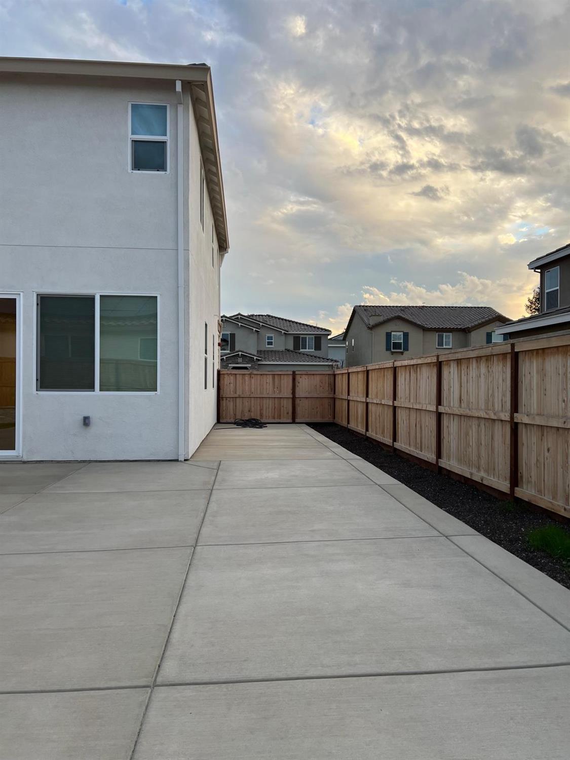 1808 Apiary Way Hughson, CA 95326 - Photo 17 of 20 a view of balcony with a lot of windows