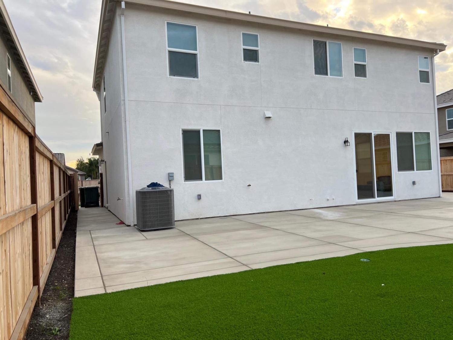 1808 Apiary Way Hughson, CA 95326 - Photo 19 of 20 a view of a house with backyard and porch