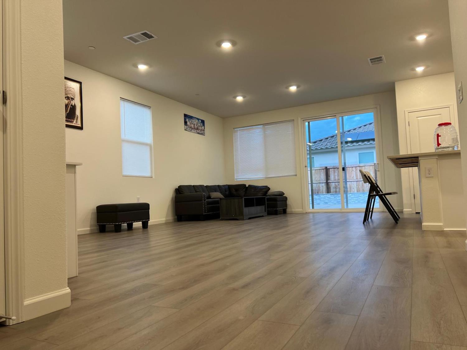 1808 Apiary Way Hughson, CA 95326 - Photo 3 of 20 a living room with furniture and a flat screen tv