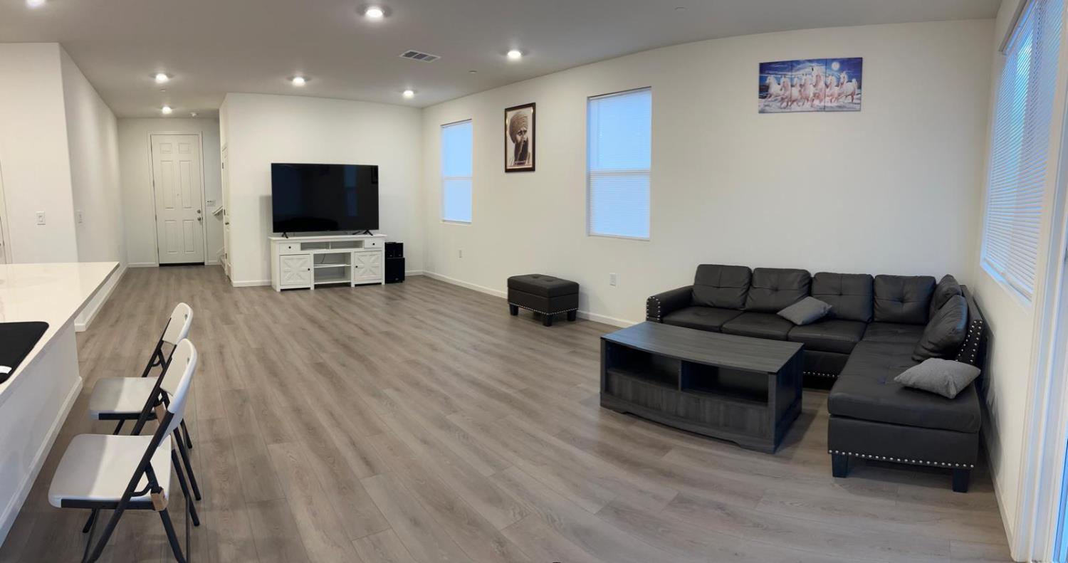 1808 Apiary Way Hughson, CA 95326 - Photo 5 of 20 a living room with furniture and a flat screen tv