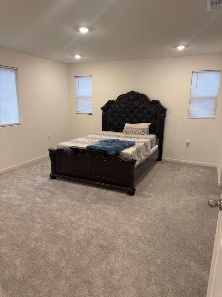 1808 Apiary Way Hughson, CA 95326 - Photo 7 of 20 a living room with a couch cabinets and a window