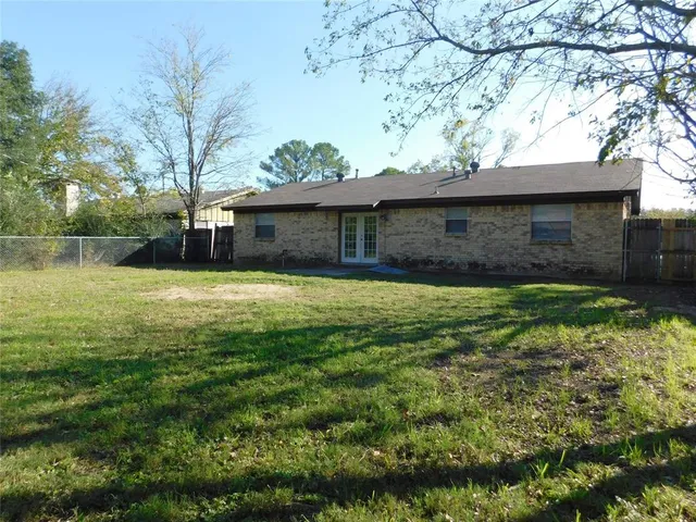 a view of a backyard with a garden