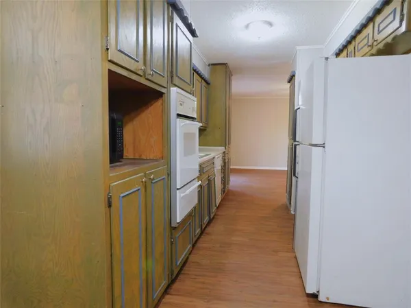a hallway with cabinets