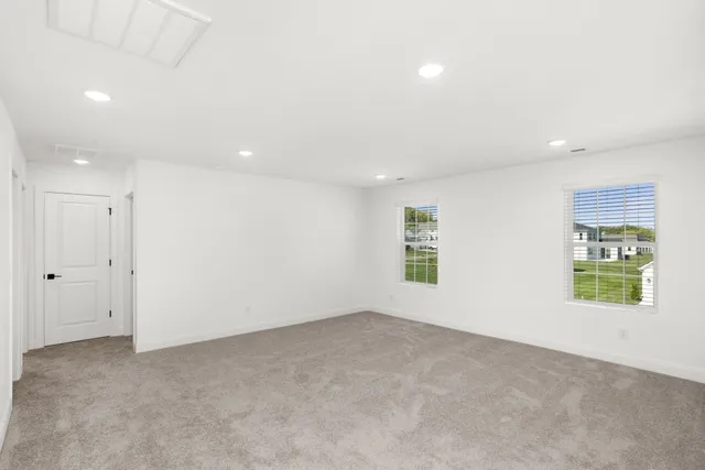 an empty room with windows