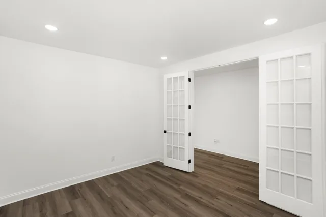a view of wooden floor in an empty room