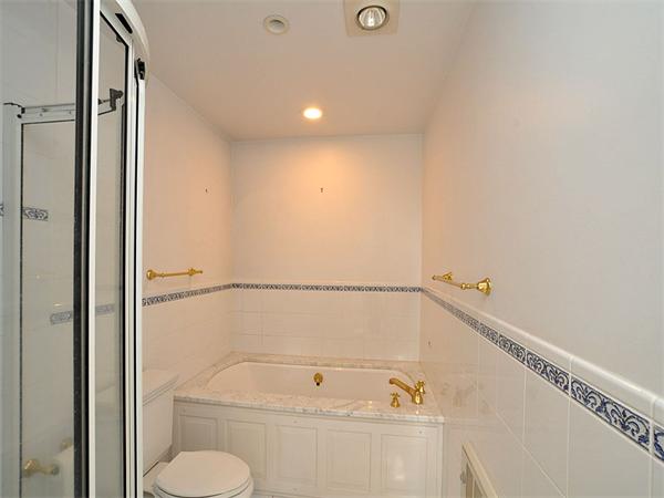 285 Independence Road Concord, MA 01742 - Photo 18 of 26 a bathroom with a bathtub and toilet
