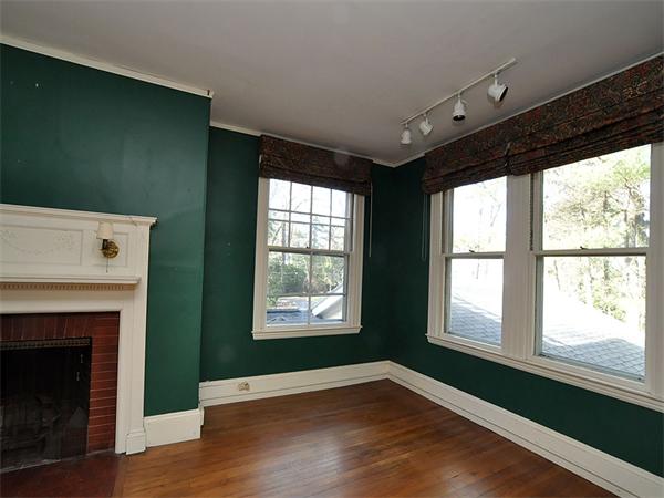 285 Independence Road Concord, MA 01742 - Photo 23 of 26 a view of an empty room with wooden floor and a window