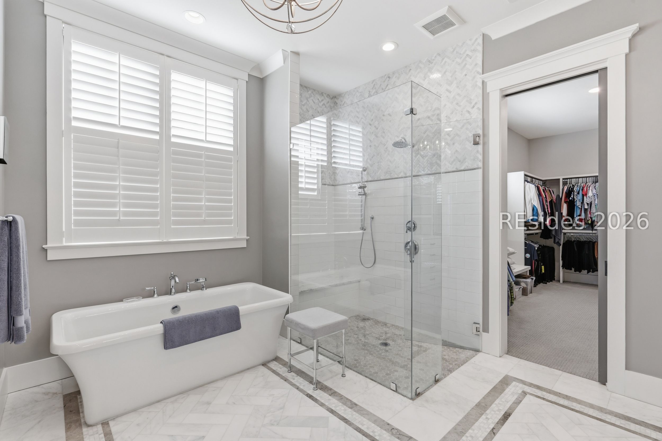 20 Fish Dancer Court Bluffton, SC 29910 - Photo 44 of 89 Primary shower and soaking tub.