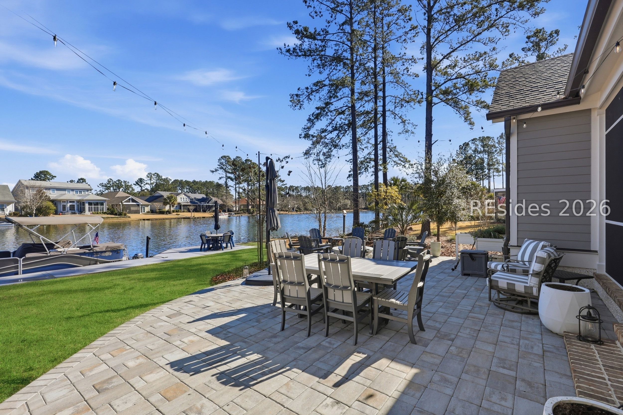 20 Fish Dancer Court Bluffton, SC 29910 - Photo 62 of 89 Large outside brick paver patio with lake views.