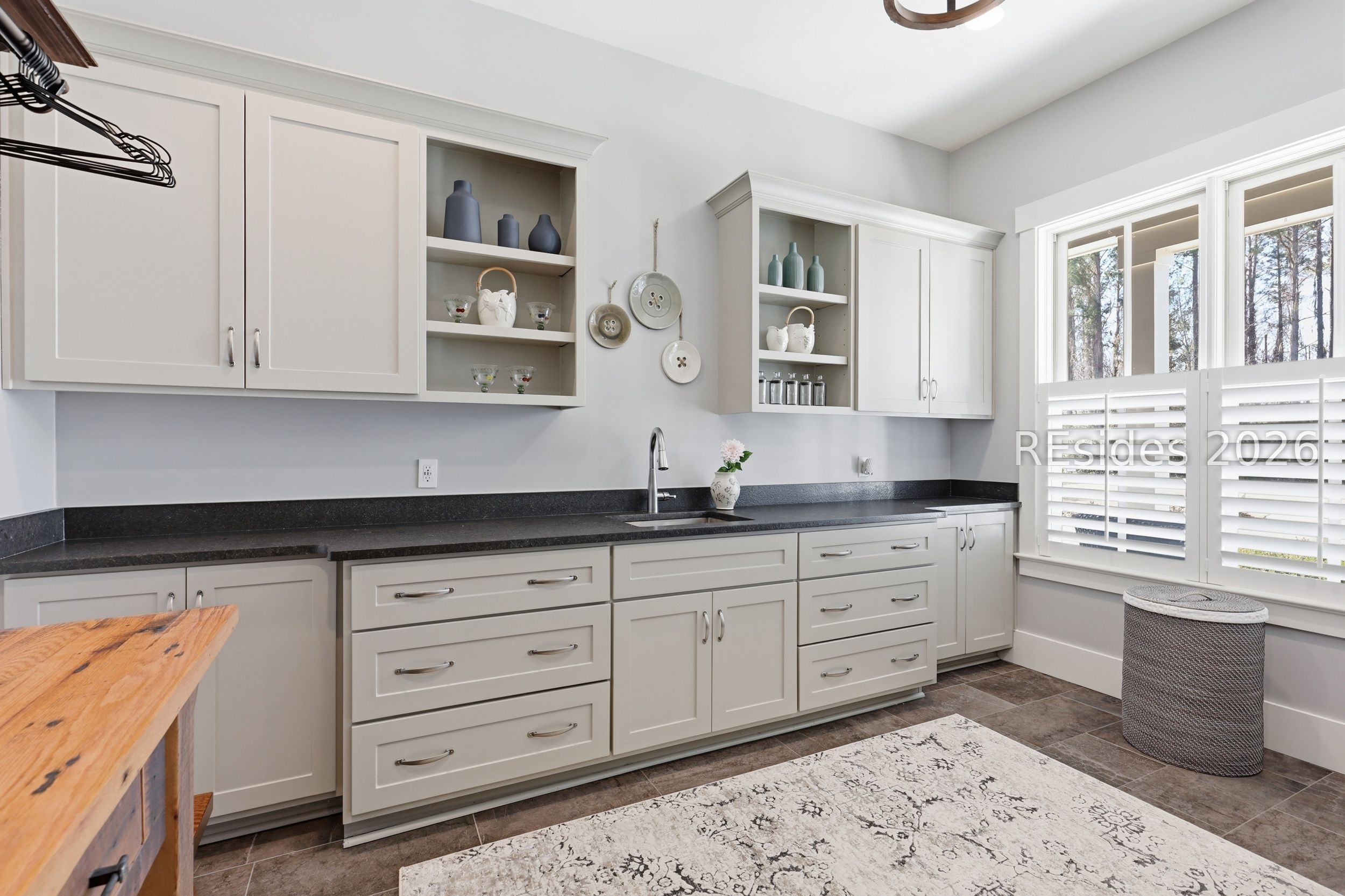 20 Fish Dancer Court Bluffton, SC 29910 - Photo 68 of 89 large laundry room with lots of cabinets.