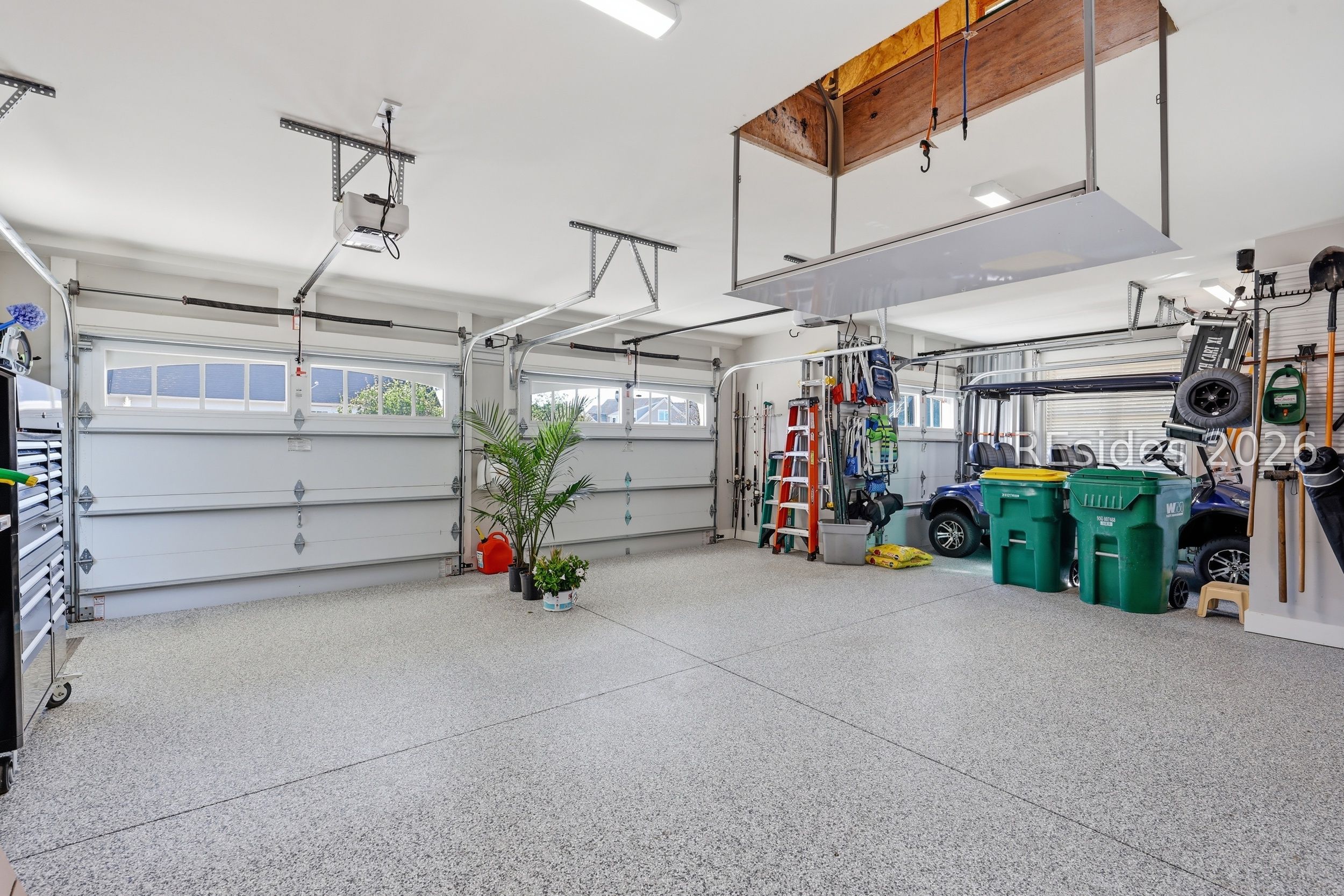 20 Fish Dancer Court Bluffton, SC 29910 - Photo 70 of 89 Oversized garage w/ golf cart bay & storage lift!