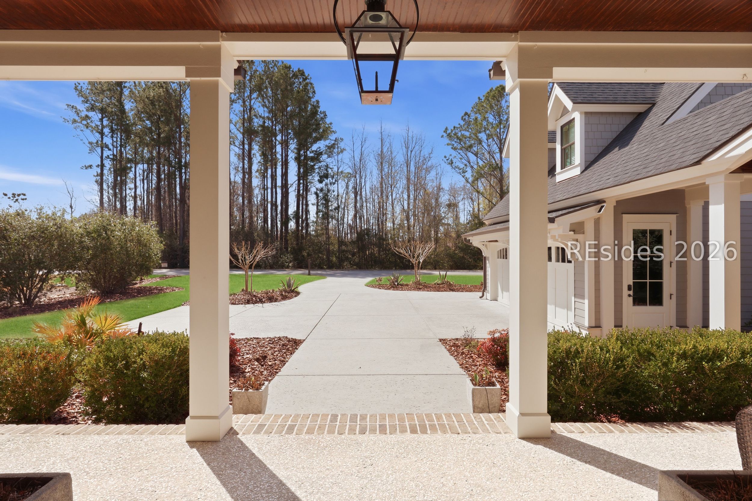 20 Fish Dancer Court Bluffton, SC 29910 - Photo 8 of 89 Front porch view to the wooded preserves.