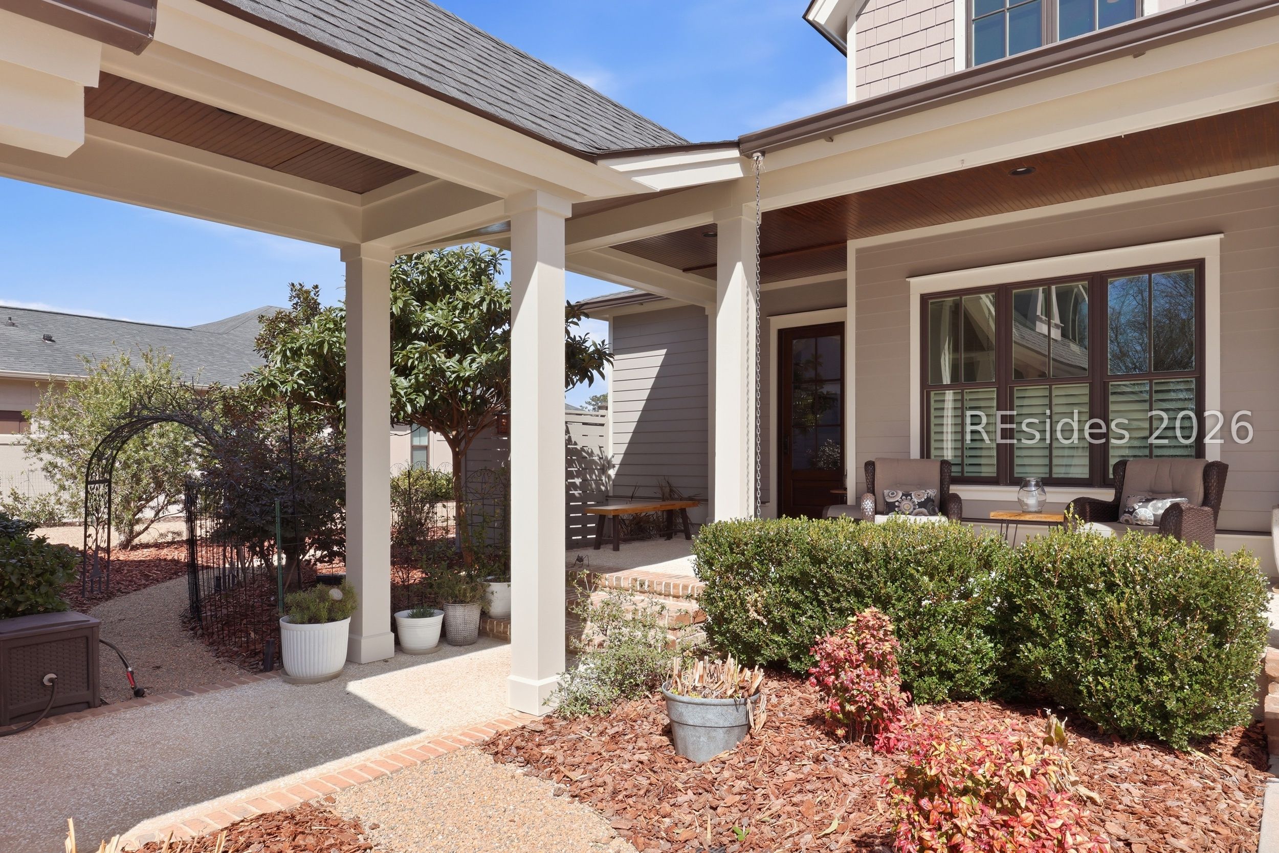 20 Fish Dancer Court Bluffton, SC 29910 - Photo 10 of 89 Covered entry to garage and side door to the home.