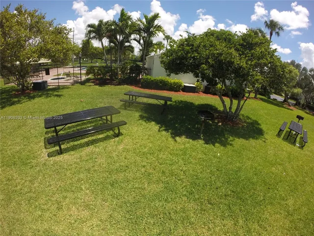 a garden view with a sitting space
