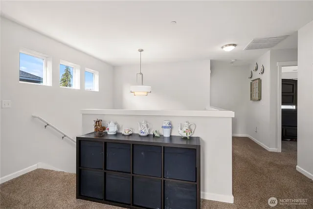 a kitchen with stainless steel appliances a refrigerator and a sink
