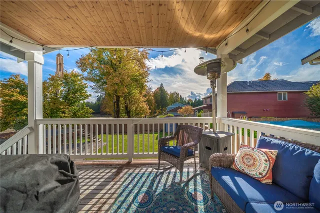 a view of a chairs on the roof deck