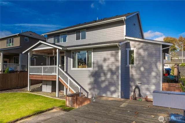 a view of house with a swimming pool