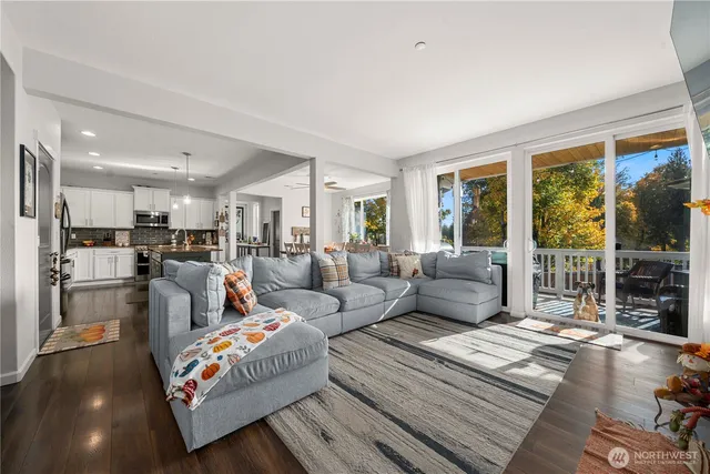 a living room with furniture and a table