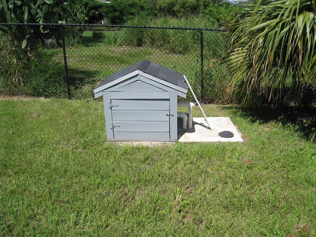 1300 Lucerne Loop Road Northeast Winter Haven, FL 33881 - Photo 40 of 40 Lake fed irrigation pump housing.