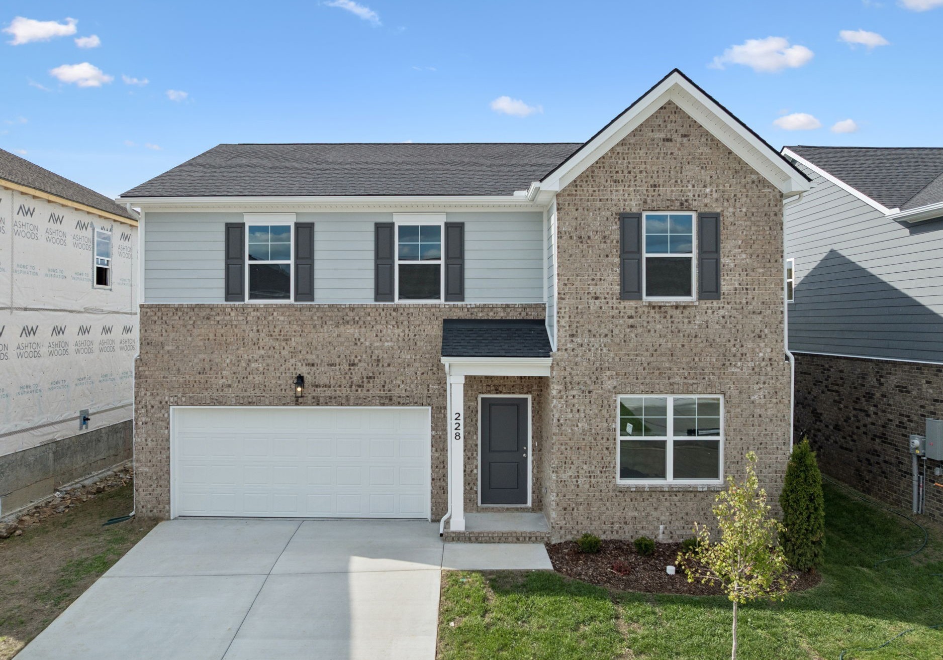 228 Limestone Way Lebanon, TN 37087 - Photo 1 of 45 a front view of a house with a yard