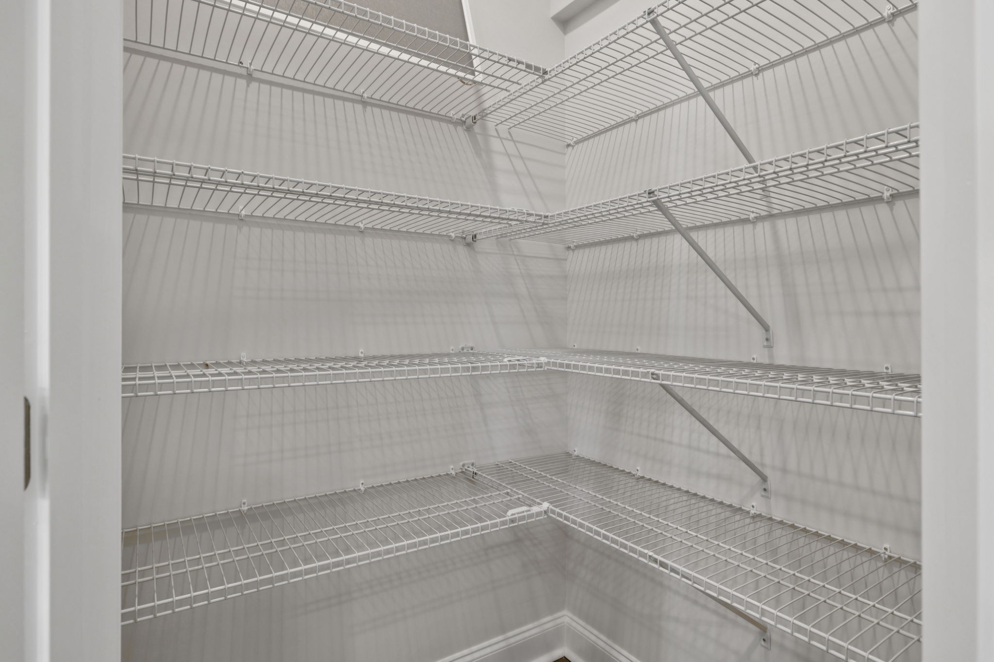 228 Limestone Way Lebanon, TN 37087 - Photo 14 of 45 a view of a room with racks on the wall