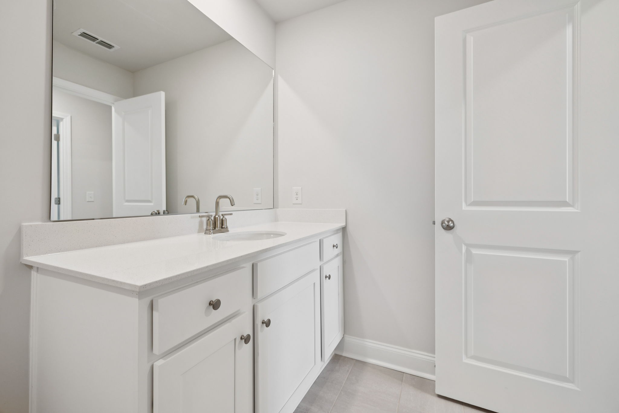 228 Limestone Way Lebanon, TN 37087 - Photo 33 of 45 a bathroom with a sink and a mirror