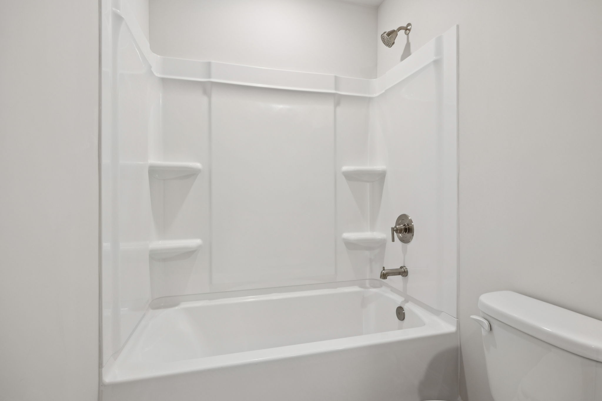 228 Limestone Way Lebanon, TN 37087 - Photo 34 of 45 a bathroom with a bathtub and a toilet
