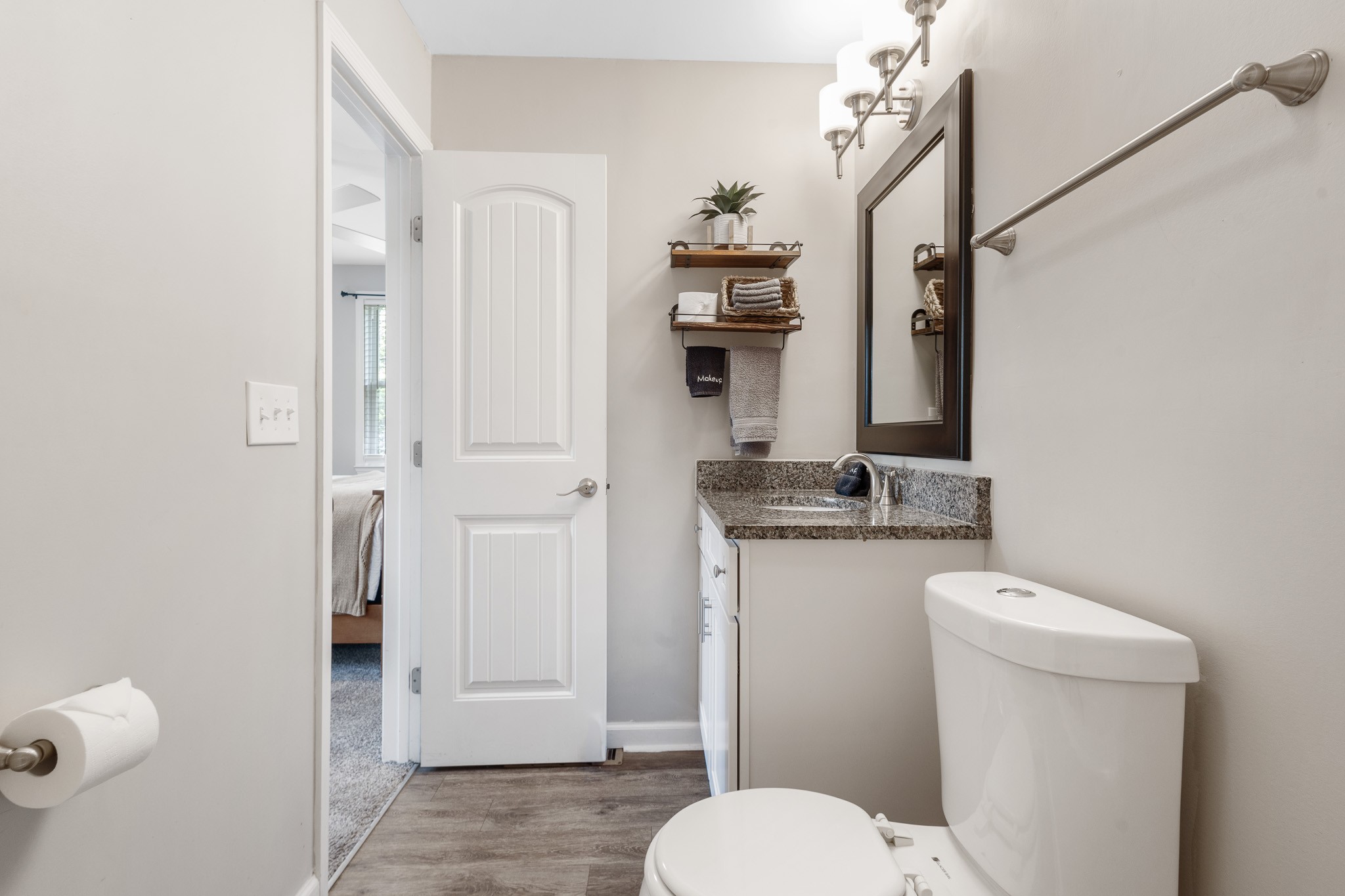 404 Elm Street Madison, TN 37115 - Photo 13 of 28 a bathroom with a granite countertop sink toilet and shower