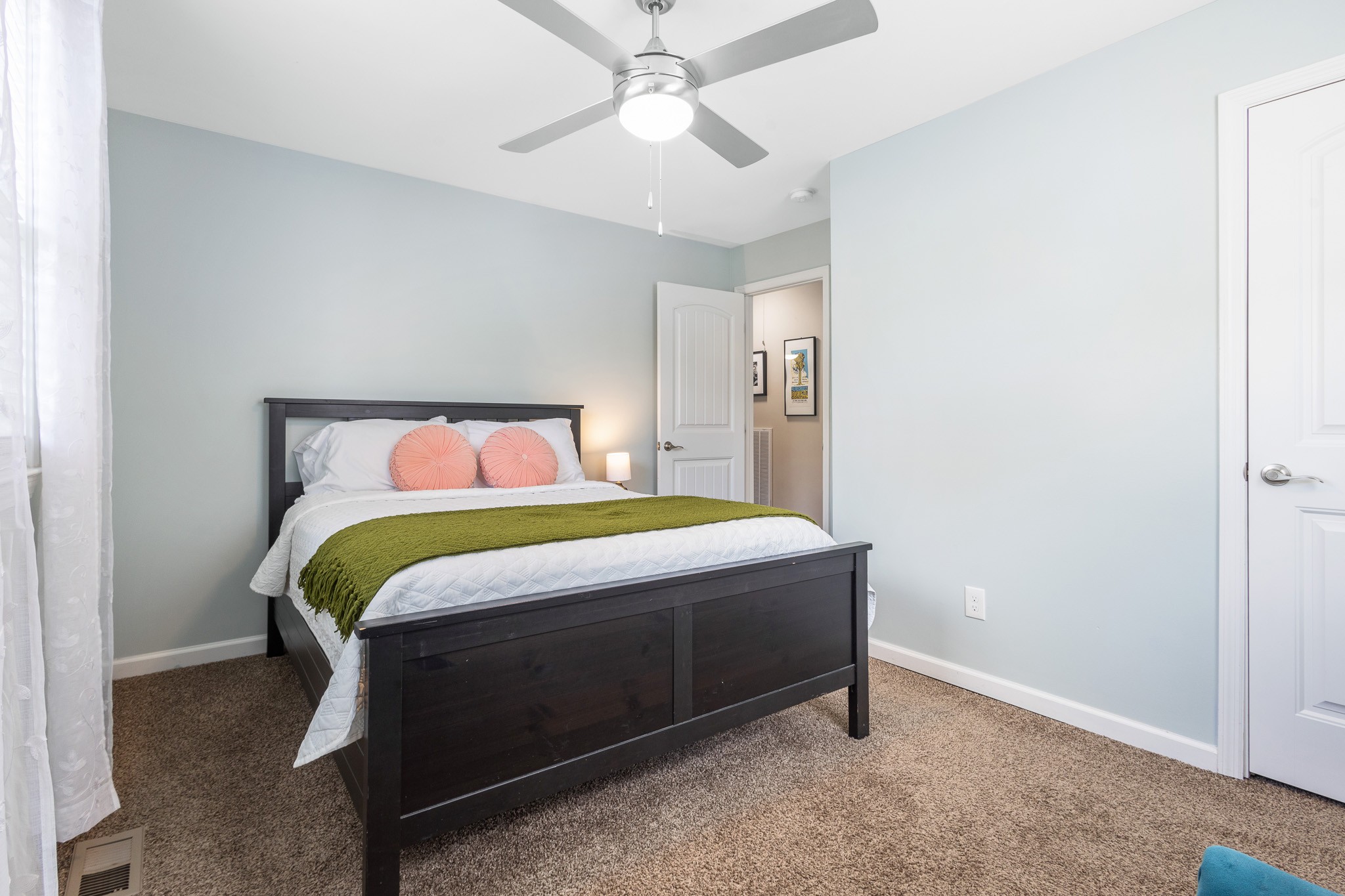 404 Elm Street Madison, TN 37115 - Photo 15 of 28 a bedroom with a bed and a ceiling fan