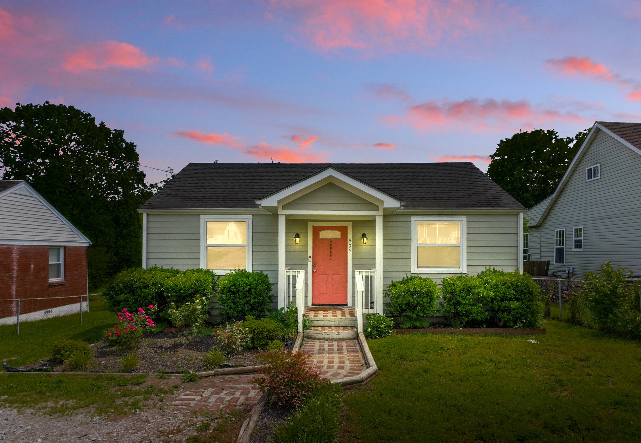404 Elm Street Madison, TN 37115 - Photo 2 of 28 a front view of a house with a yard