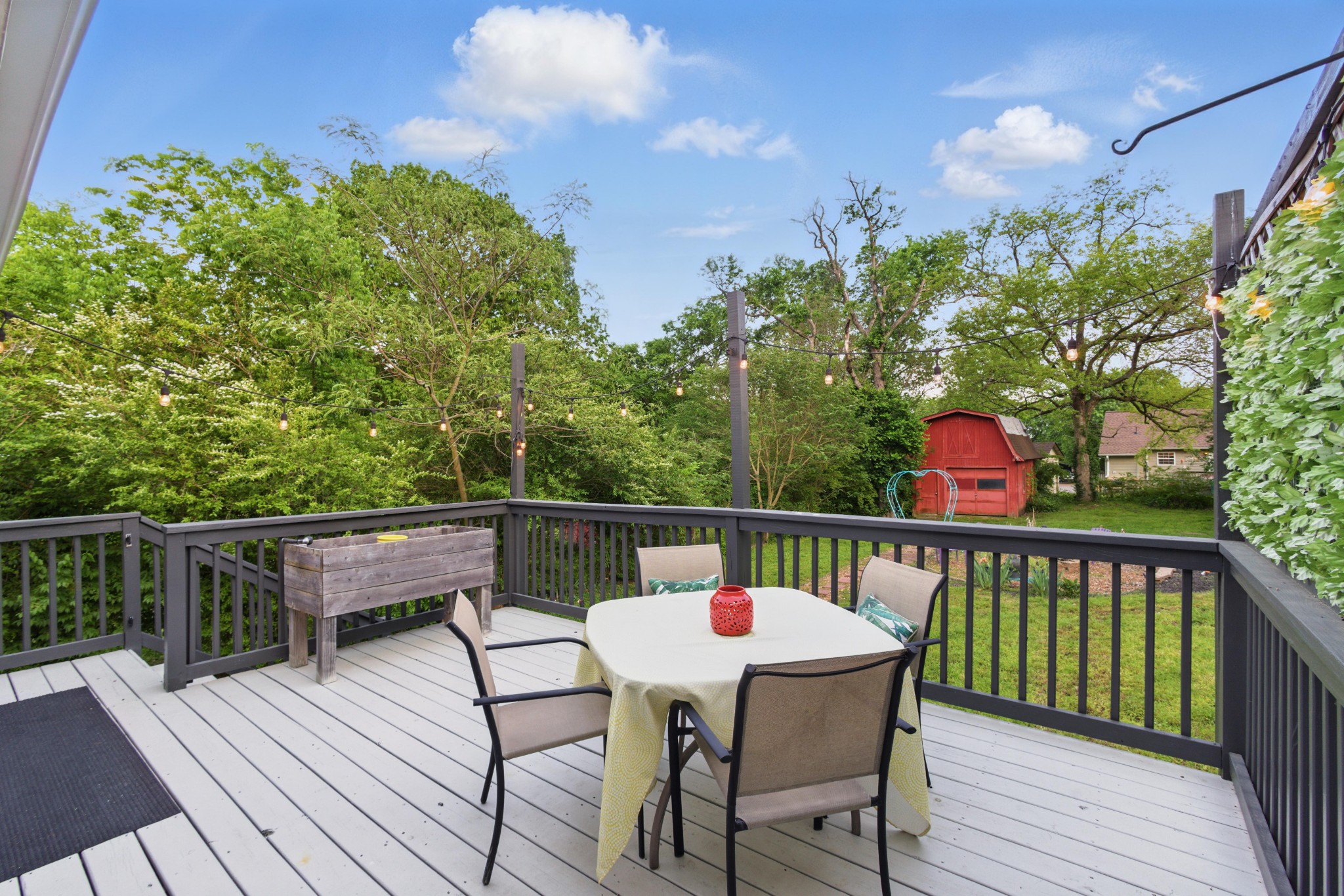 404 Elm Street Madison, TN 37115 - Photo 22 of 28 a balcony with wooden floor table and chairs