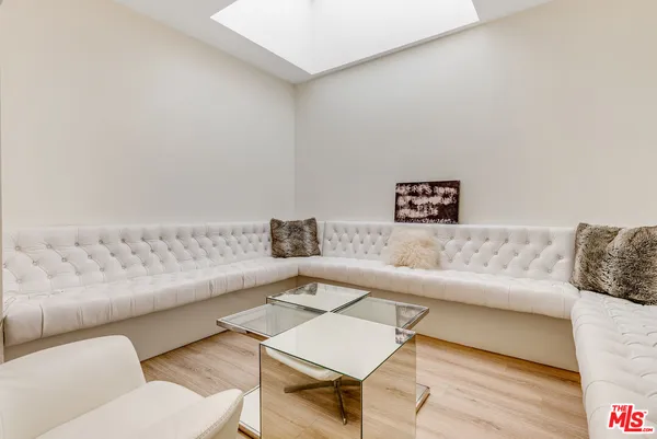 a living room with furniture and a couch