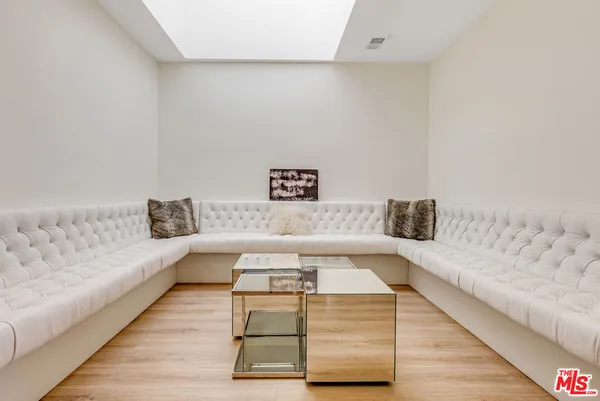 a living room with furniture and a couch
