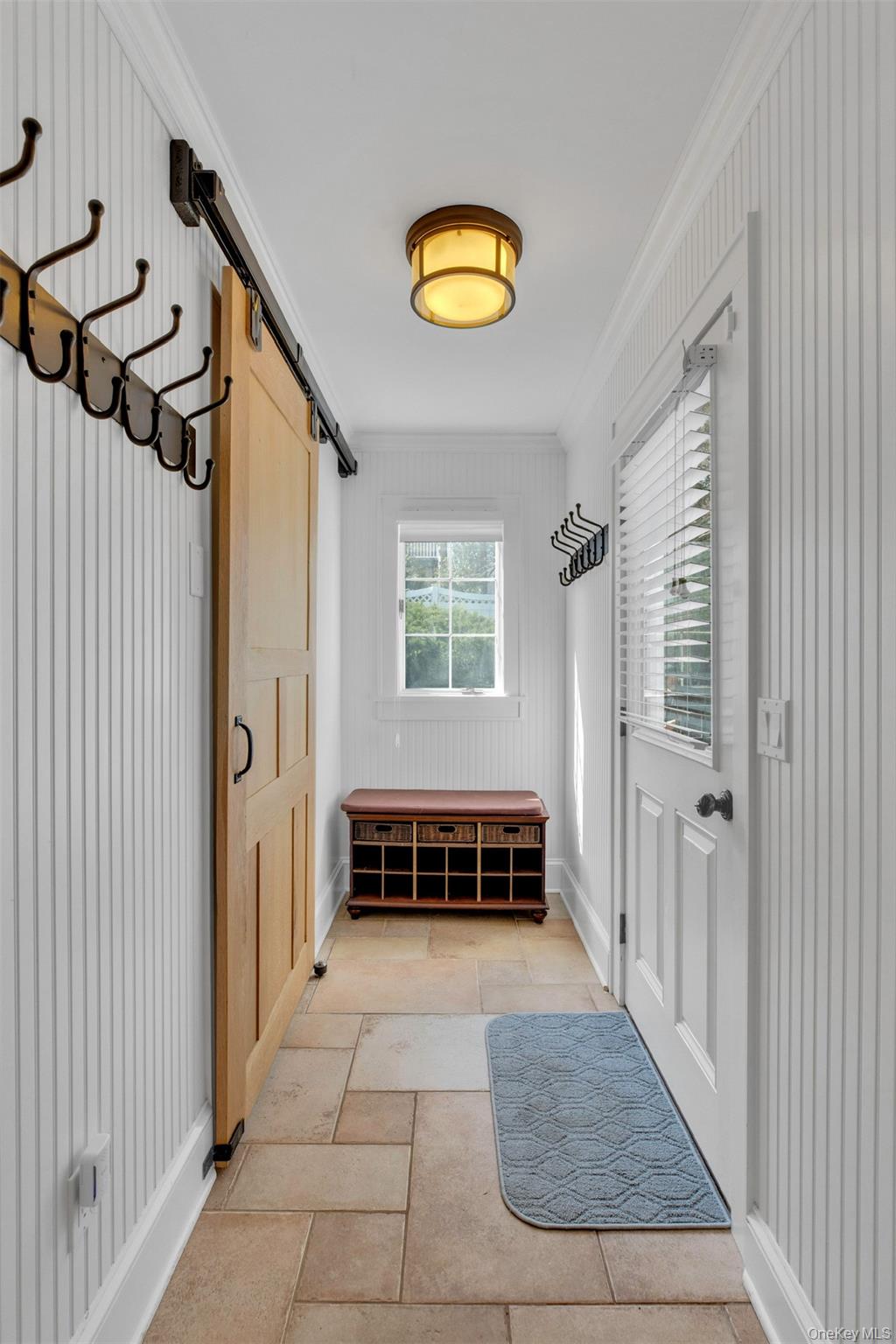 345 Colonial Road Southold, NY 11971 - Photo 17 of 43 a view of an entryway with a livingroom