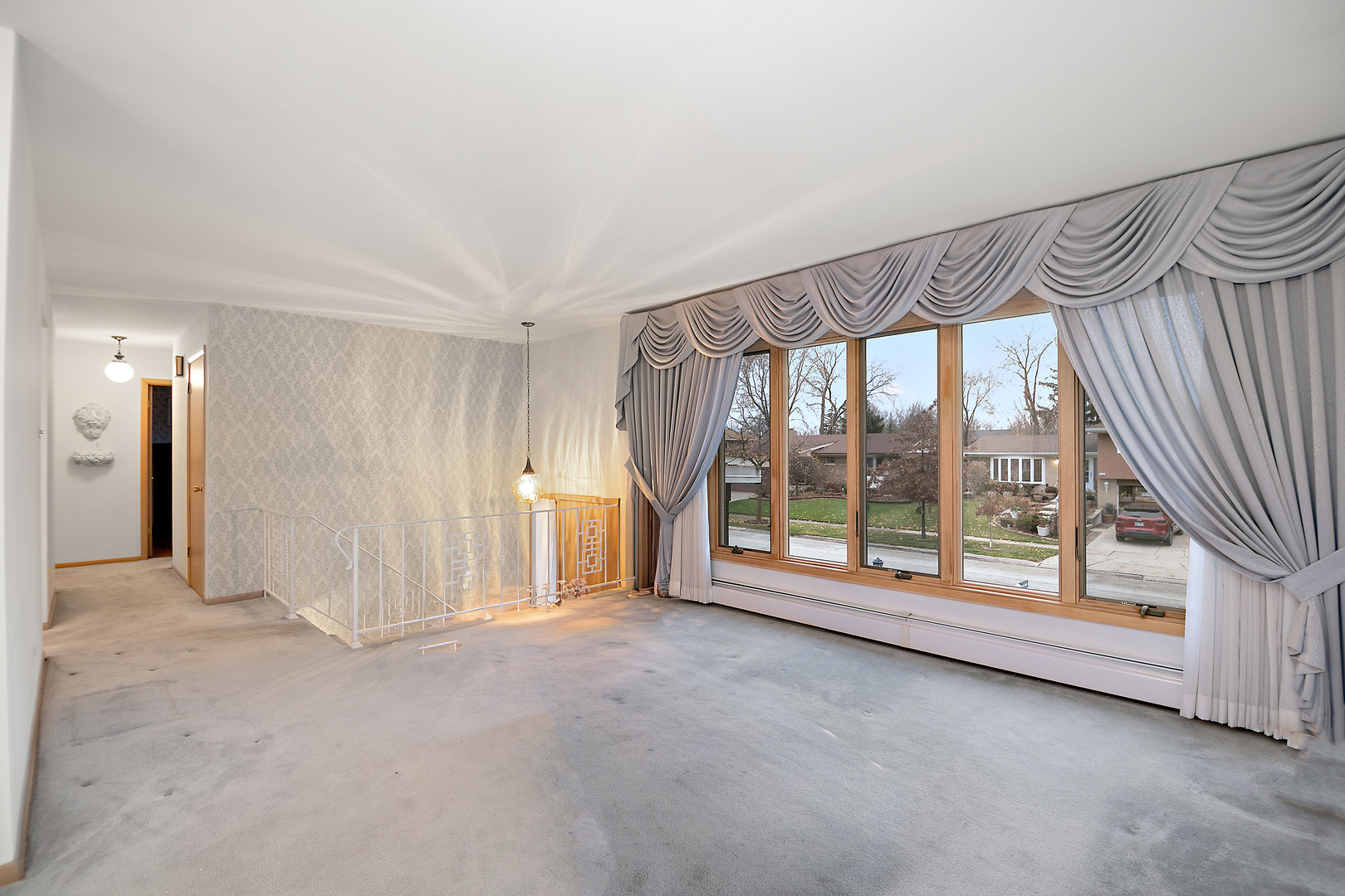 6508 Cedar Road Oak Forest, IL 60452 - Photo 3 of 27 a view of an empty room with a sliding door and balcony
