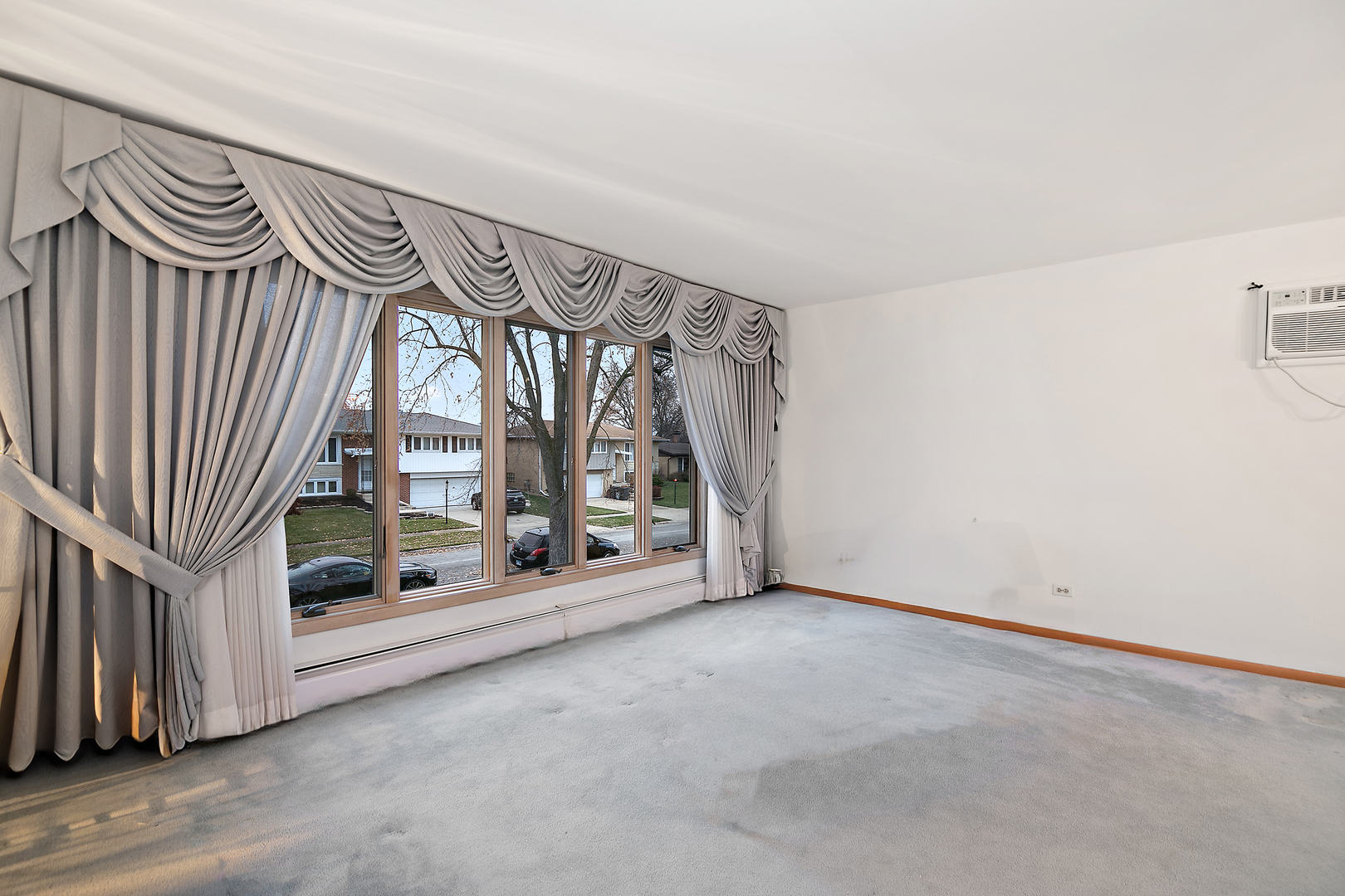 6508 Cedar Road Oak Forest, IL 60452 - Photo 5 of 27 a view of an empty room with a fireplace in entryway