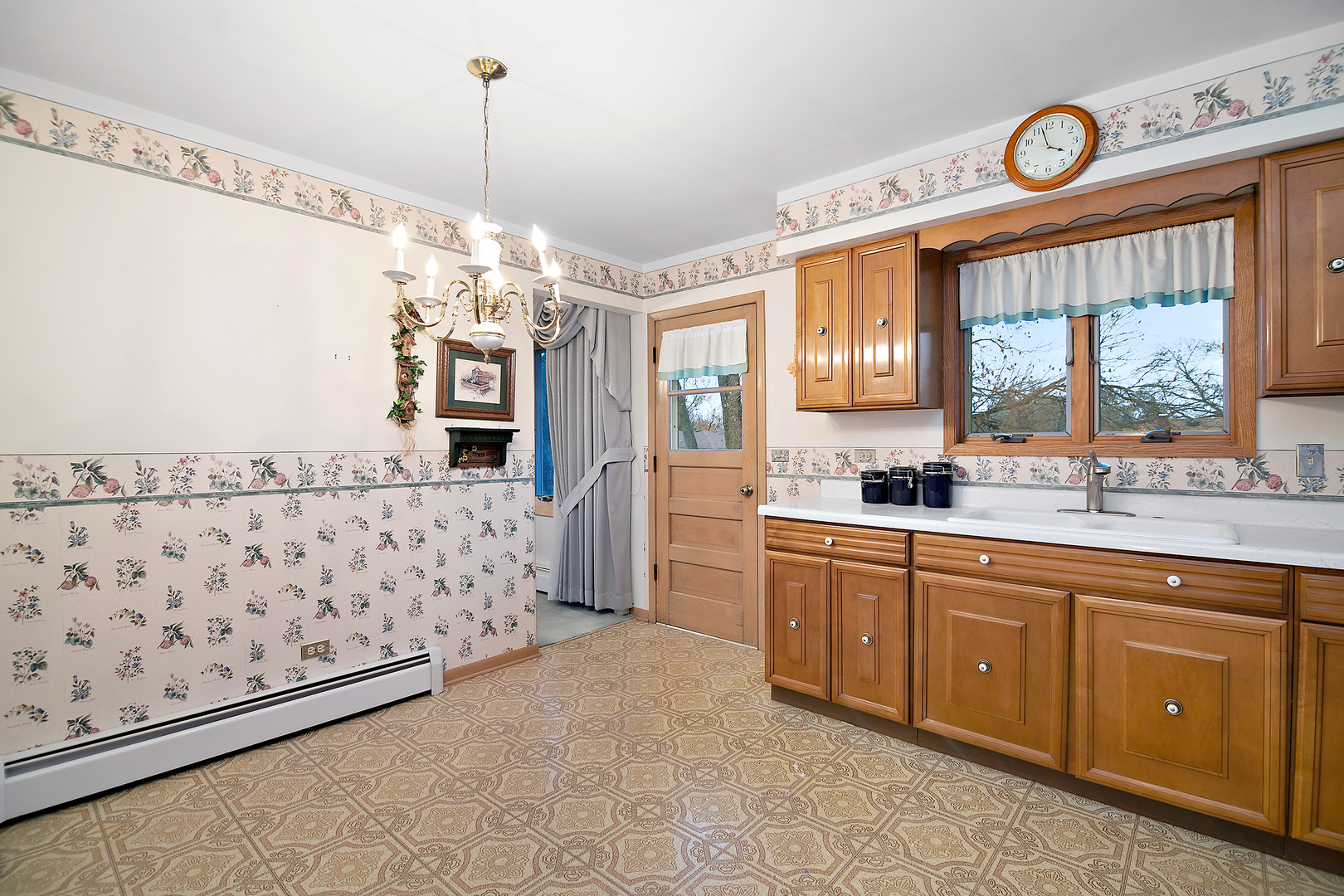 6508 Cedar Road Oak Forest, IL 60452 - Photo 8 of 27 a spacious bathroom with a double vanity sink and a window