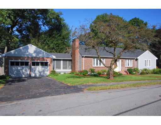 20 Mansfield Road Wellesley, MA 02481 - Photo 1 of 14 a front view of a house with a yard