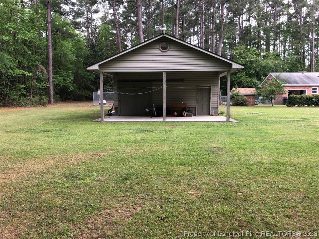 846 Bee Gee Road Lumberton, NC 28358 - Photo 12 of 42 a view of a house with backyard and garden